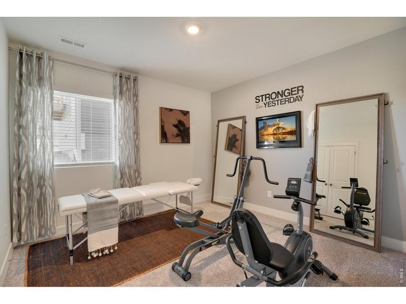 Furnished interior view inside a new home in Fossil Creek Ranch, Windsor (Image 9).