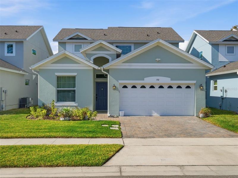Front exterior of a new home in Blue Diamond , Orlando, FL, highlighting curb appeal (Image 21). Front exterior of a new home in Blue Diamond , Orlando, FL, highlighting curb appeal (Image 21).