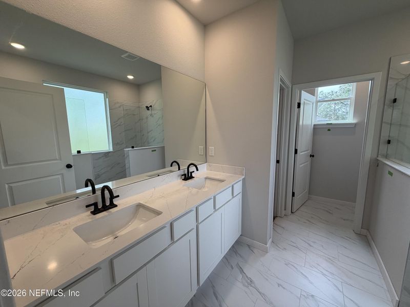 Furnished interior view inside a new home in Reserve East, Flagler Beach (Image 18).