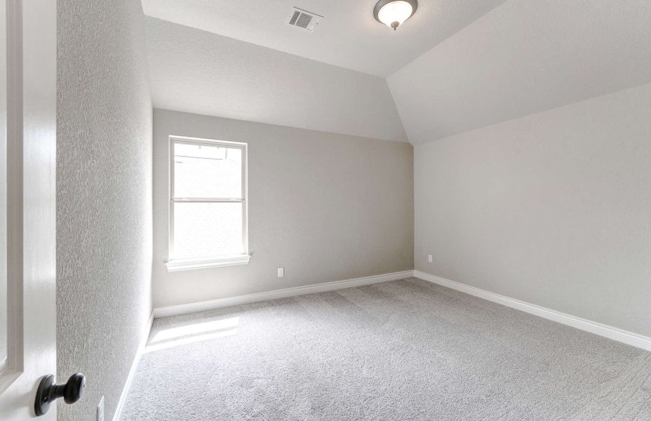 Representative unfurnished interior of a home built from the 3799 by Ravenna Homes in Artavia 70′, Conroe (Image 52).