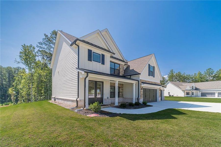 Exterior details and patio area of a home in , Loganville (Image 29).