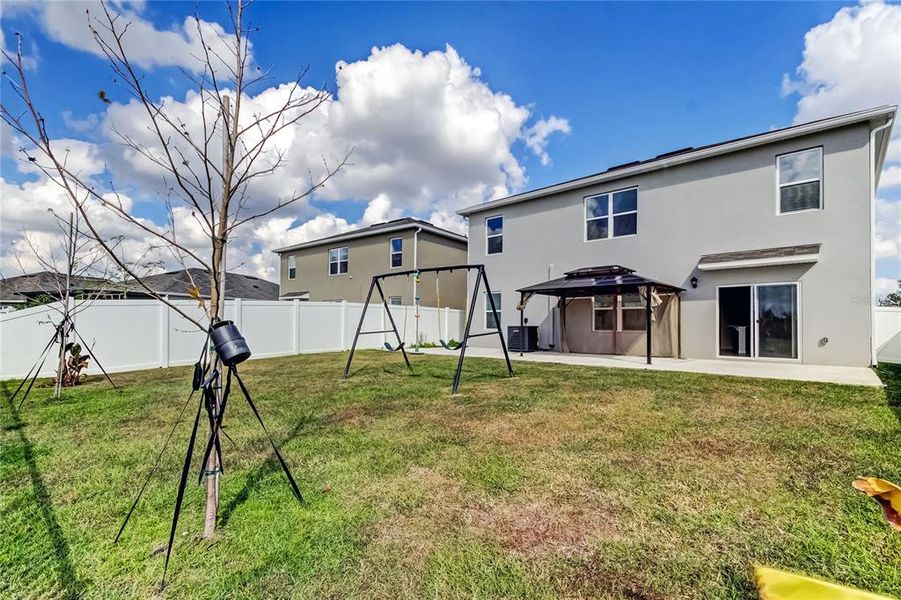 Exterior details and patio area of a home in Lakes at Laurel Highlands, Lakeland (Image 32).