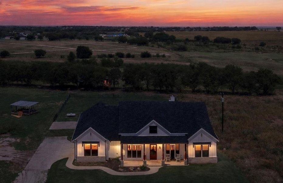 Front exterior of a new home in , Krum, TX, highlighting curb appeal (Image 21).