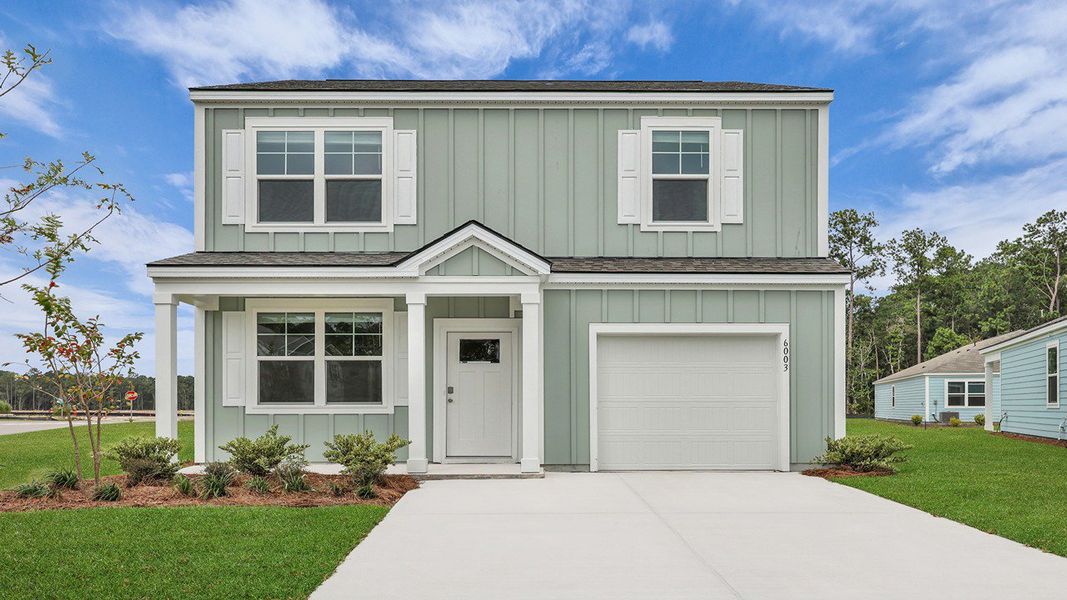 Front exterior of a new home in Hillcrest, Ravenel, SC, highlighting curb appeal (Image 16). Front exterior of a new home in Hillcrest, Ravenel, SC, highlighting curb appeal (Image 16).