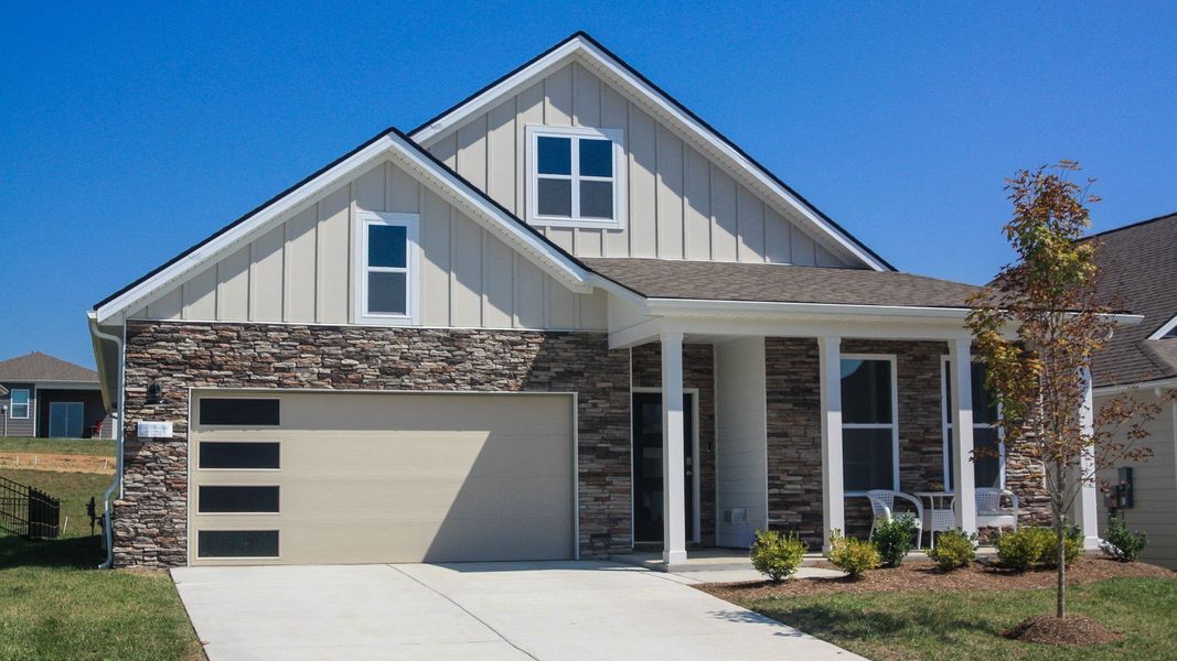 Front exterior of a new home in Nexus South, Gallatin, TN, highlighting curb appeal (Image 1). Front exterior of a new home in Nexus South, Gallatin, TN, highlighting curb appeal (Image 1).
