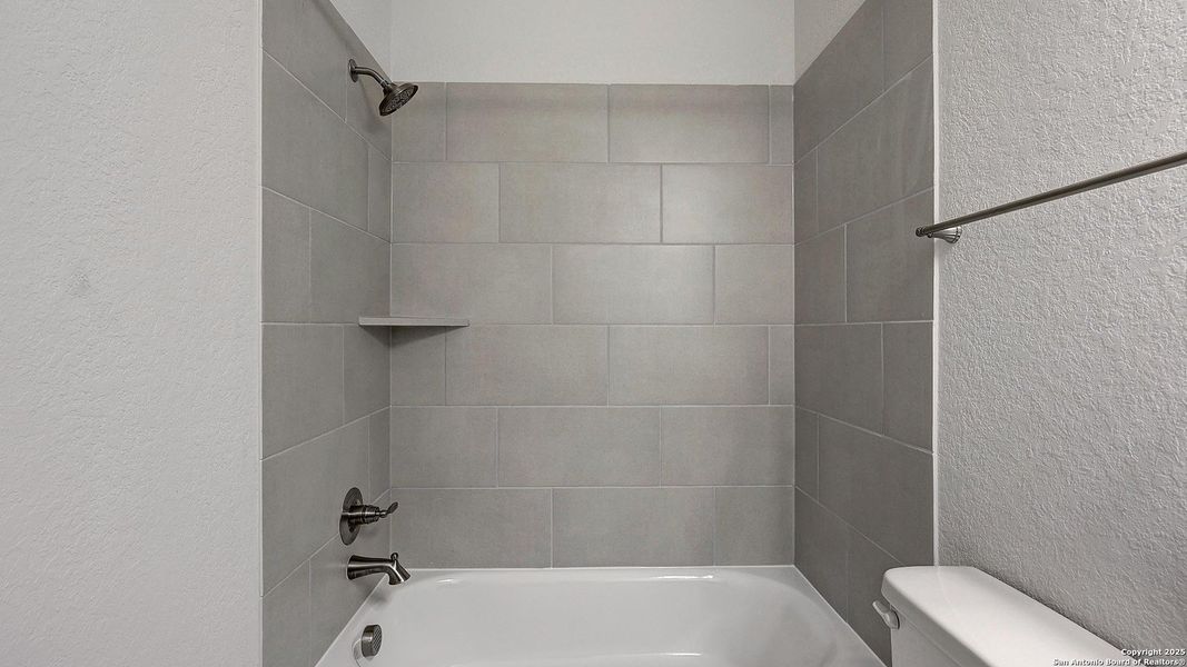 Furnished interior view inside a new home in Kallison Ranch 60', San Antonio (Image 14).