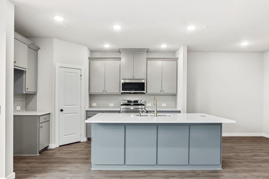 Furnished interior view inside a new home in Wildridge, Oak Point (Image 6).