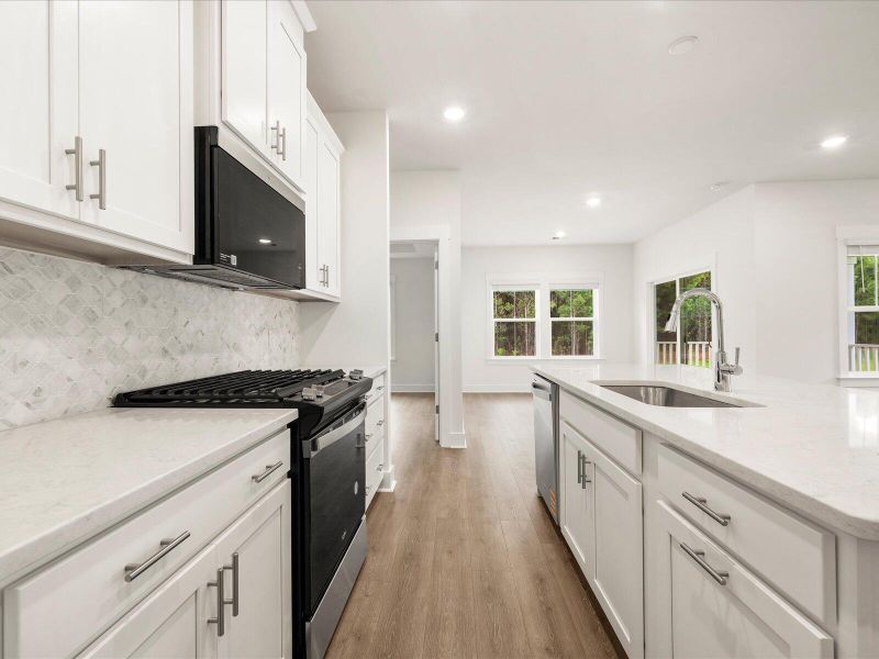 Furnished interior view inside a new home in The Coves at Lakes of Cane Bay, Summerville (Image 12).