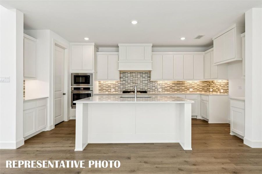 Packed with space and style, you'll find your dream kitchen waiting for you in our Tristan plan!  REPRESENTATIVE PHOTO