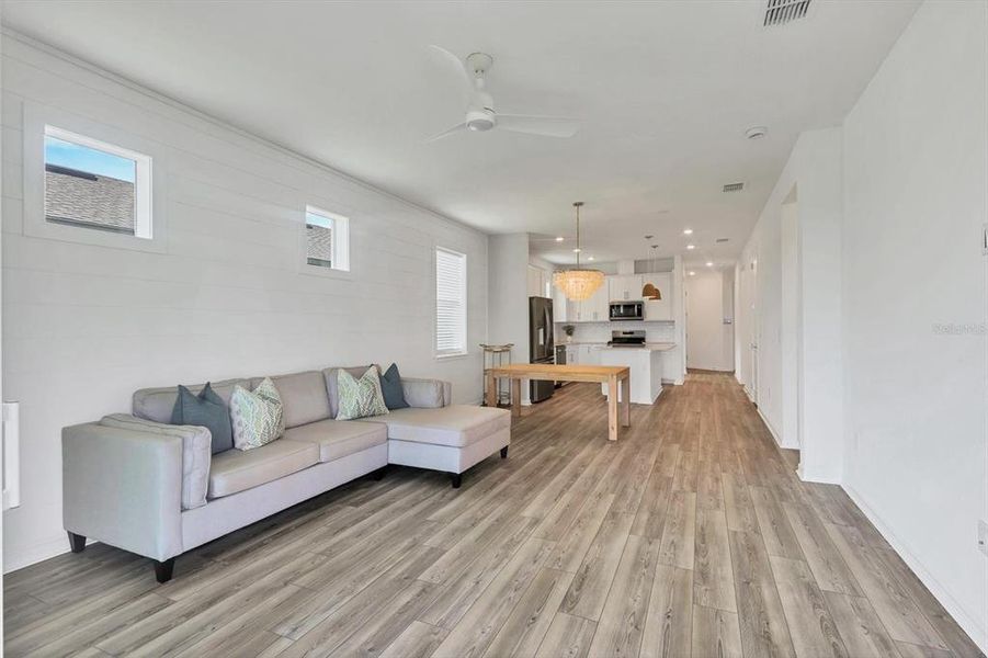 Looking into home from sliders- Gathering room, floating Cafe area and kitchen