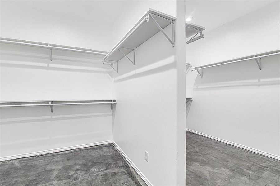 Walk in closet featuring tile patterned flooring