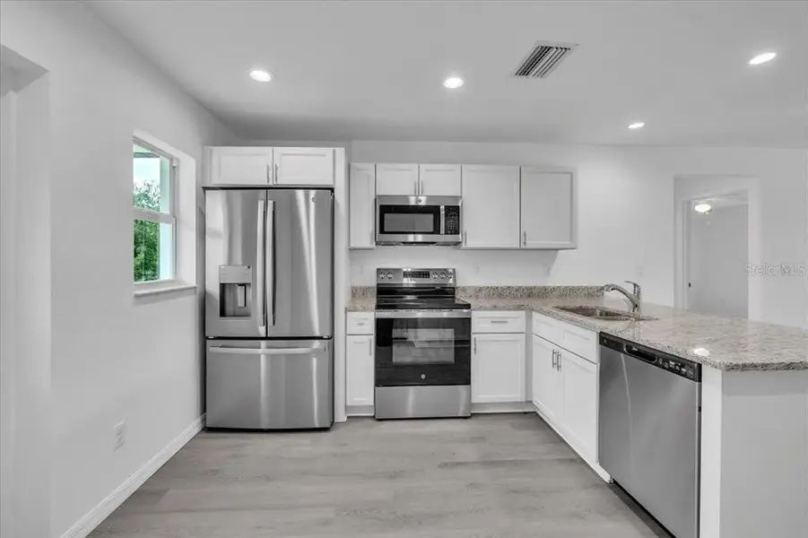 Furnished interior view inside a new home in , Punta Gorda (Image 5).