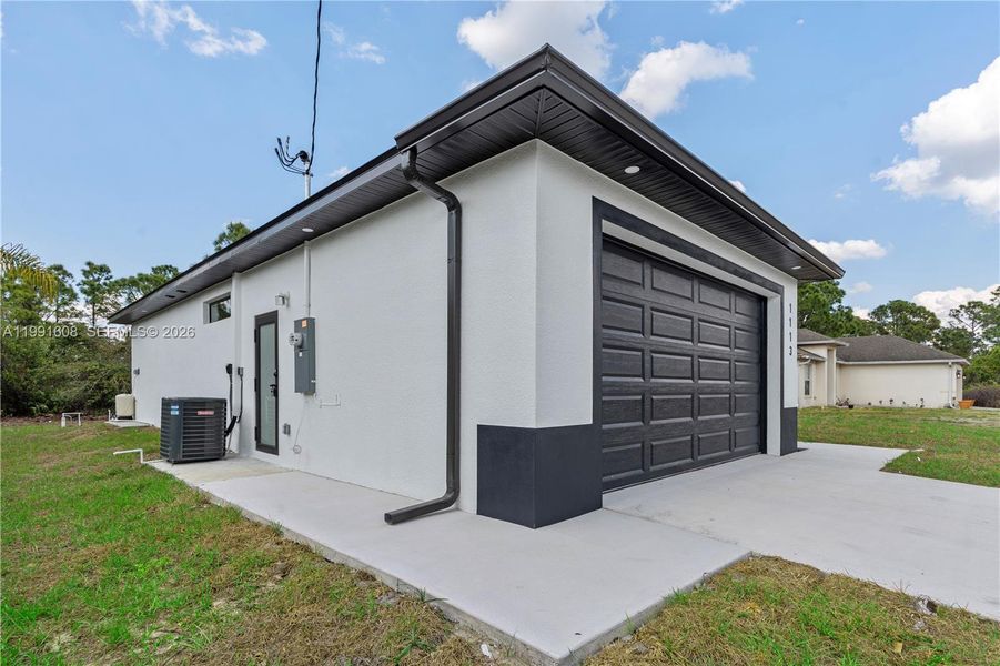 Exterior details and patio area of a home in , Lehigh Acres (Image 34). Exterior details and patio area of a home in , Lehigh Acres (Image 34).