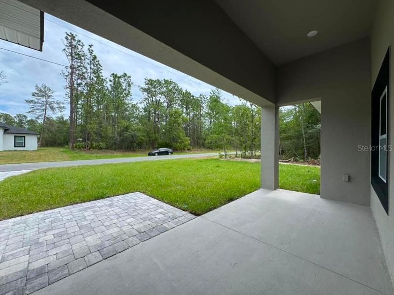 Exterior details and patio area of a home in , Citrus Springs (Image 22).
