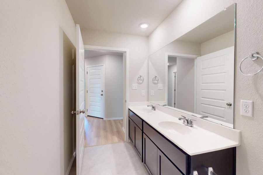 Furnished interior view inside a new home in Carillon, Manor (Image 13).