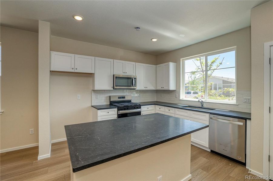 Furnished interior view inside a new home in The Aurora Highlands Summit Collection, Aurora (Image 7). Furnished interior view inside a new home in The Aurora Highlands Summit Collection, Aurora (Image 7).