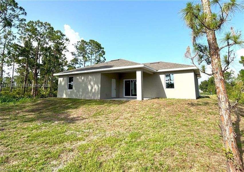 Exterior details and patio area of a home in , Lehigh Acres (Image 15).