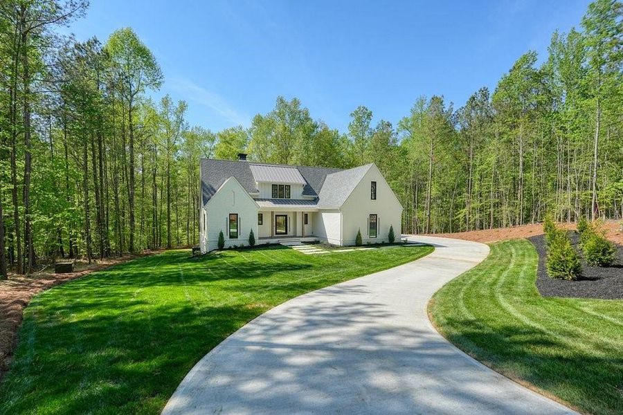 Front exterior of a new home in , Canton, GA, highlighting curb appeal (Image 30).