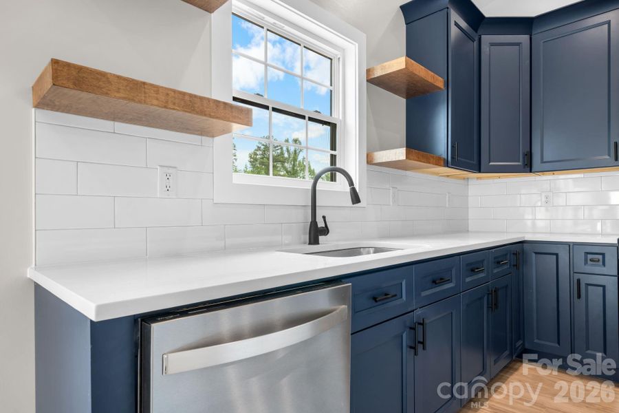 Furnished interior view inside a new home in , Lenoir (Image 13).