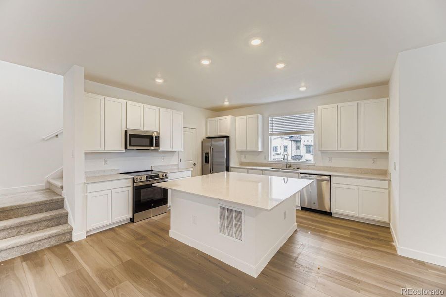 Furnished interior view inside a new home in Vermilion Creek: The Skyline Collection, Centennial (Image 7).