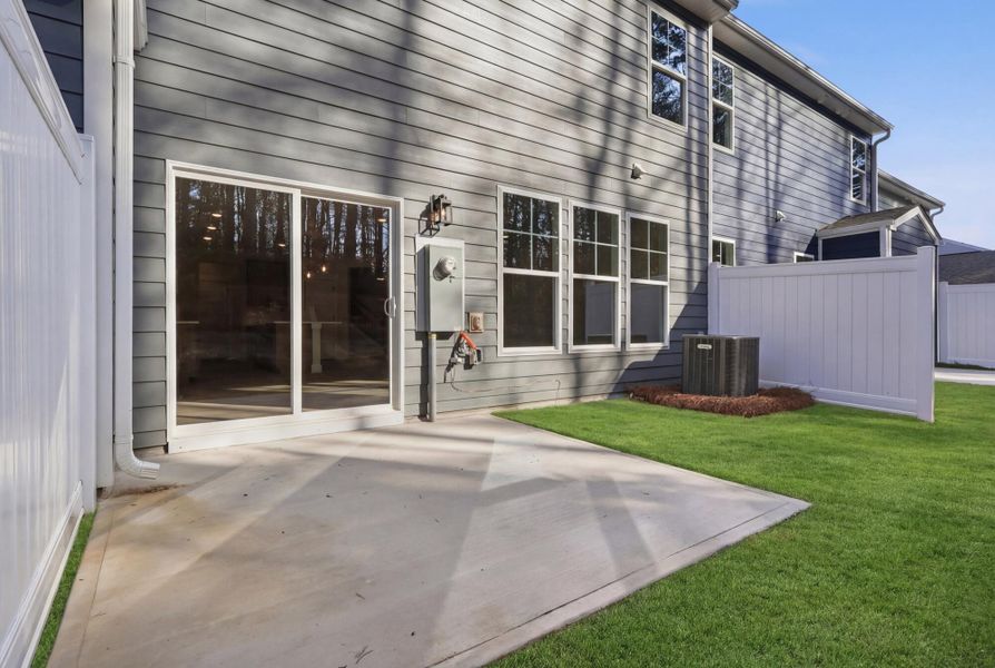 Exterior details and patio area of a home in Harbor Crossing, Greensboro (Image 4).