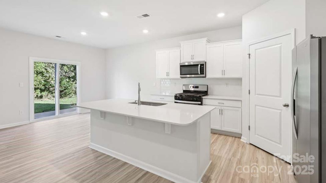 Furnished interior view inside a new home in Wallace Springs, Statesville (Image 5).