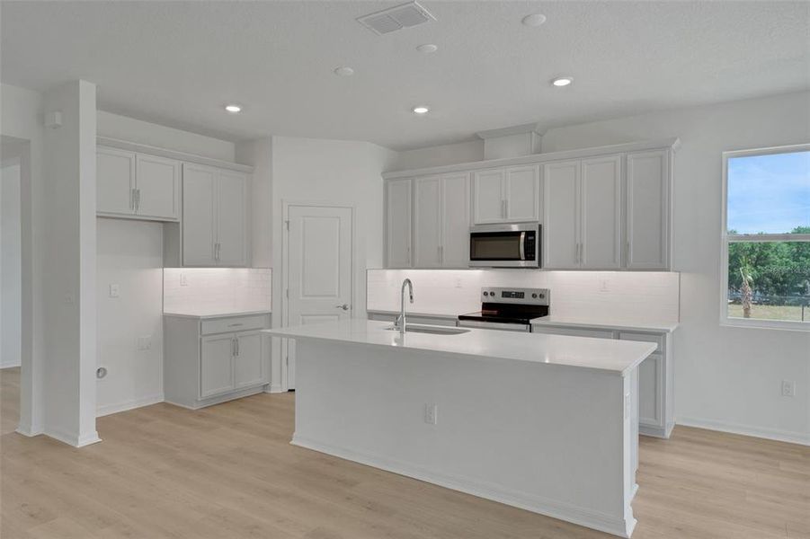 Furnished interior view inside a new home in Tuscan Hills, Dade City (Image 12).