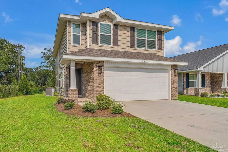 Front exterior of a new home in Allison Acres, Cantonment, FL, highlighting curb appeal (Image 2). Front exterior of a new home in Allison Acres, Cantonment, FL, highlighting curb appeal (Image 2).