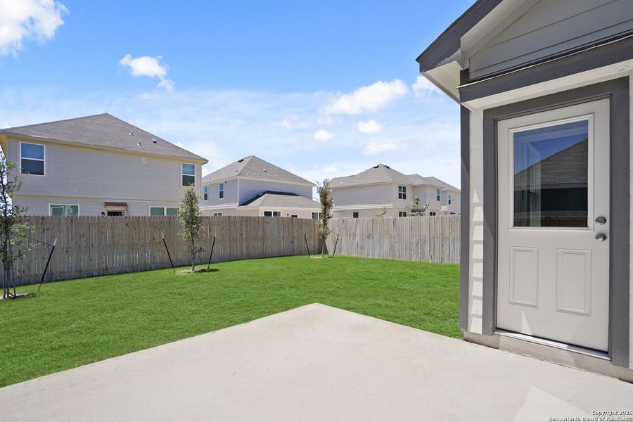 Front exterior of a new home in Applewhite Meadows, San Antonio, TX, highlighting curb appeal (Image 19). Front exterior of a new home in Applewhite Meadows, San Antonio, TX, highlighting curb appeal (Image 19).