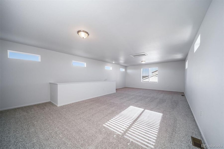 Spacious, unfurnished interior of a new home in Muegge Farms, Bennett (Image 16).