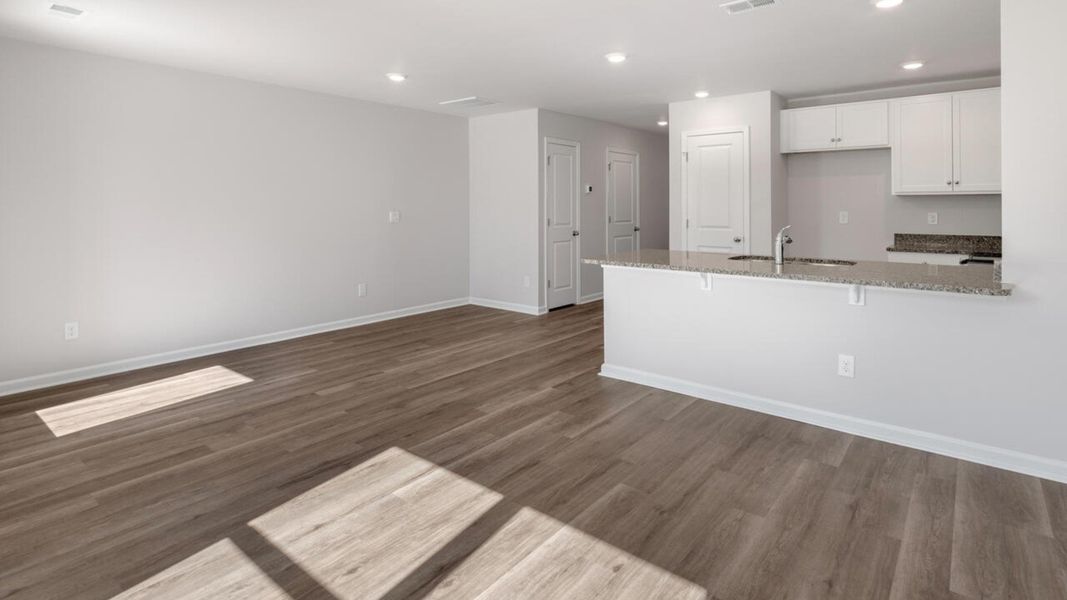 Spacious, unfurnished interior of a new home in The Landing at Sidbury Station, Castle Hayne (Image 19).