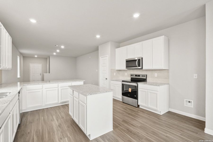 Furnished interior view inside a new home in Abbott Place, St. Hedwig (Image 9).