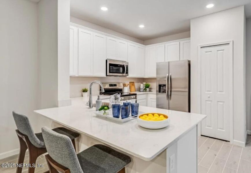 Furnished interior view inside a new home in Silver Falls Townhomes at Silverleaf, St. Johns (Image 12).