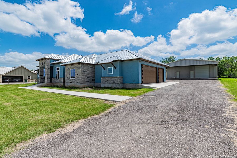 Front exterior of a new home in , Adkins, TX, highlighting curb appeal (Image 29). Front exterior of a new home in , Adkins, TX, highlighting curb appeal (Image 29).