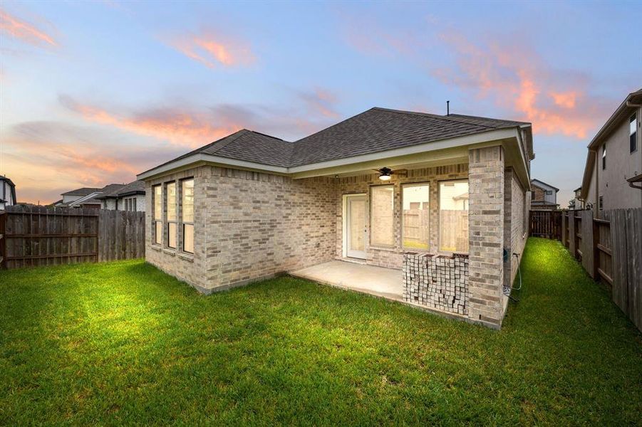 Come and see this spacious backyard with its beautiful covered patio. There is plenty of room for the kids to play and adults to relax! Perfect for your outdoor living space, patio furniture, bbq pit, and so much more. The possibilities are endless!