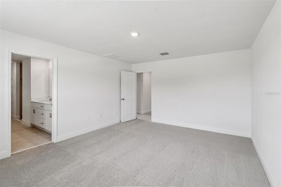 Spacious, unfurnished interior of a new home in The Reserve at Hammock Oaks - Classic Series, Lady Lake (Image 34). Spacious, unfurnished interior of a new home in The Reserve at Hammock Oaks - Classic Series, Lady Lake (Image 34).
