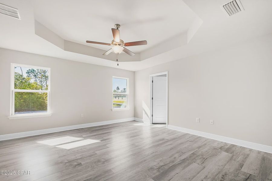 Representative unfurnished interior of a home built from the Plan 2101 by Adams Homes in The Bluffs at Lafayette, Freeport (Image 17).