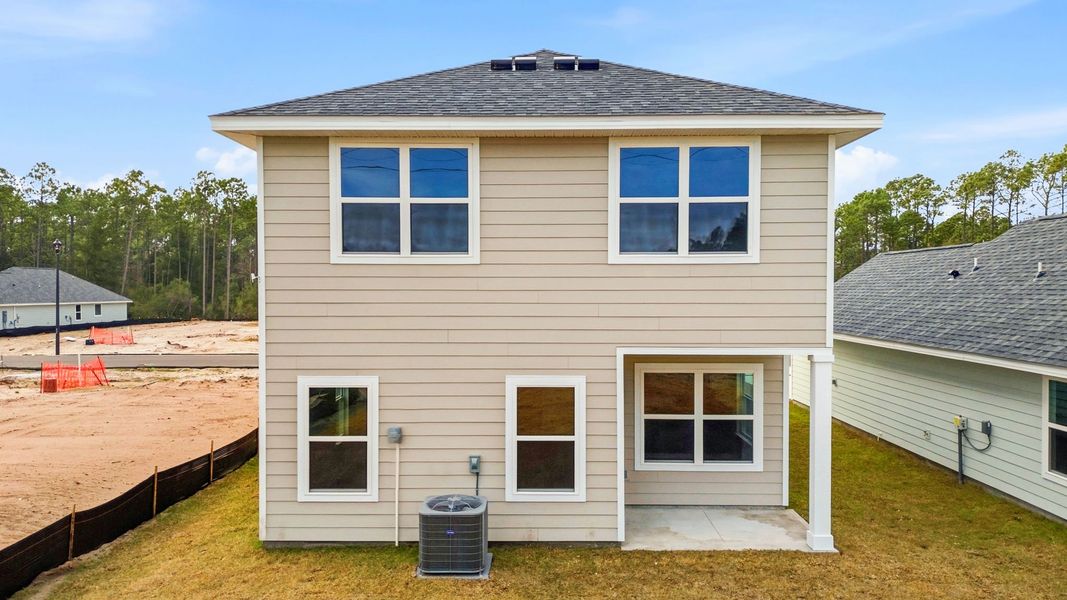 Exterior details and patio area of a home in Chateau Nemours, Port Saint Joe (Image 28).