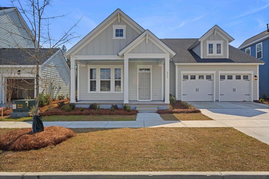 Front exterior of a new home in Nexton - Midtown - The Village Collection, Summerville, SC, highlighting curb appeal (Image 1).