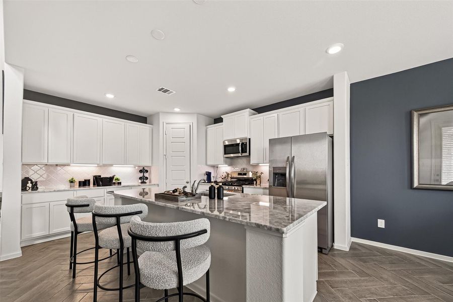 Furnished interior view inside a new home in Rates starting as low as, Iowa Colony (Image 13).