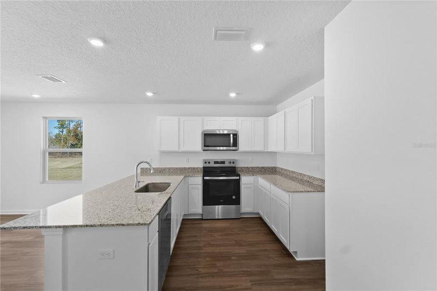 Furnished interior view inside a new home in Baywood Hills, Alachua (Image 3).