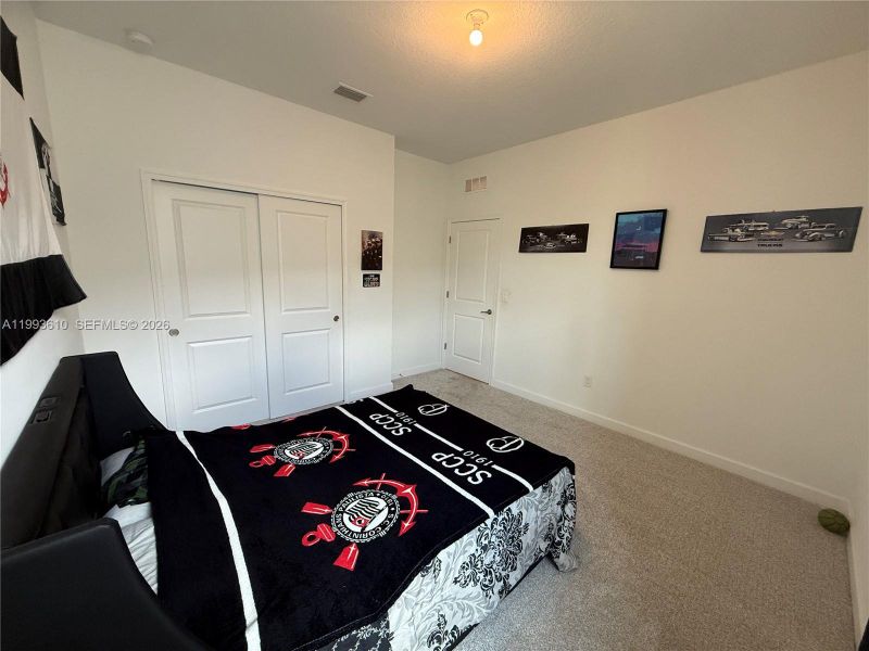 Furnished interior view inside a new home in Tradition, Port St. Lucie (Image 41).