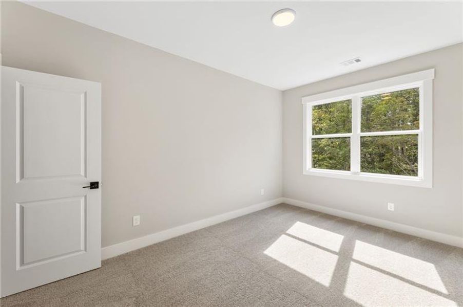 Spacious, unfurnished interior of a new home in Arden on Lanier, Cumming (Image 27).