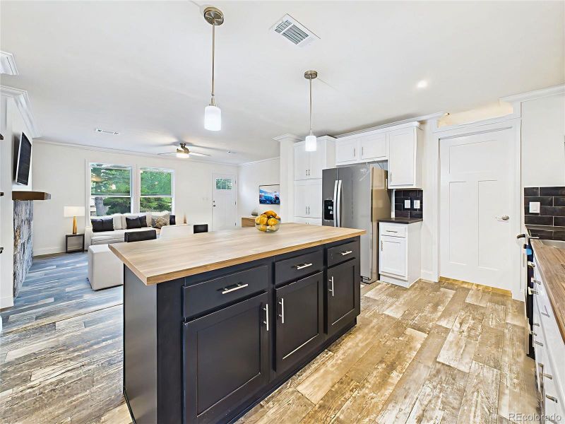 Flows seamlessly into the kitchen and great room for easy entertaining.