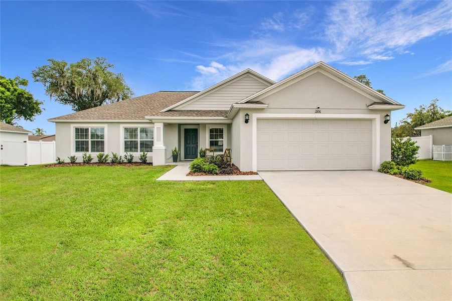 Front exterior of a new home in , Bartow, FL, highlighting curb appeal (Image 22).