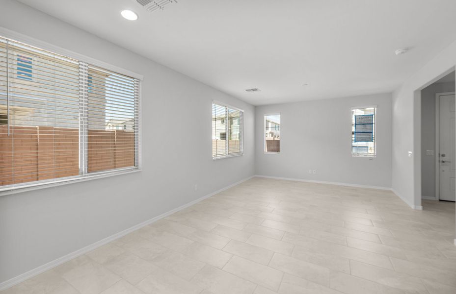 Spacious, unfurnished interior of a new home in Asante- Atrium Series, Surprise (Image 21).