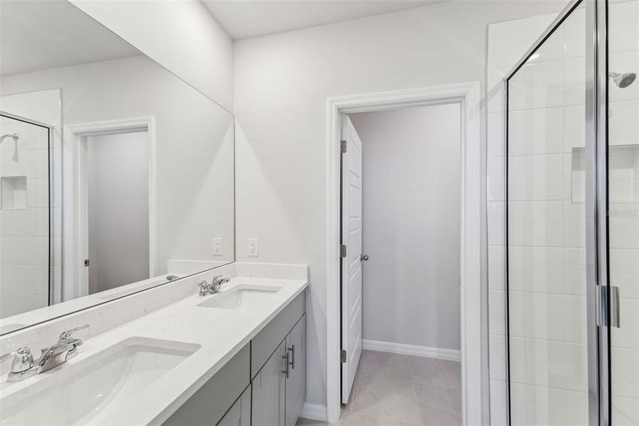 Furnished interior view inside a new home in Crescent Lakes - Premier Series, Punta Gorda (Image 13).