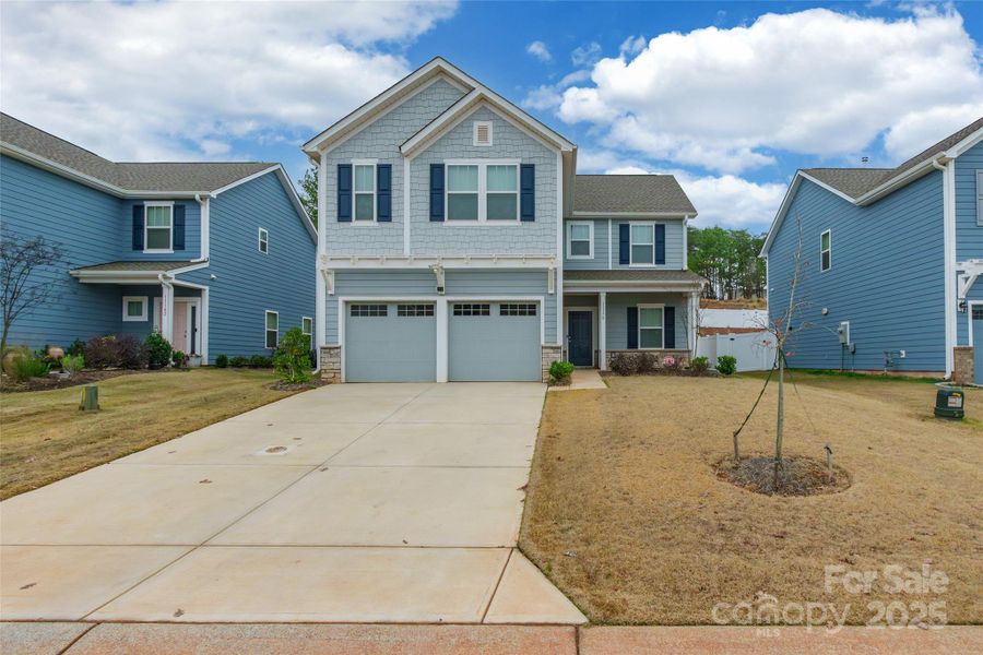 Front exterior of a new home in , Lancaster, SC, highlighting curb appeal (Image 1). Front exterior of a new home in , Lancaster, SC, highlighting curb appeal (Image 1).