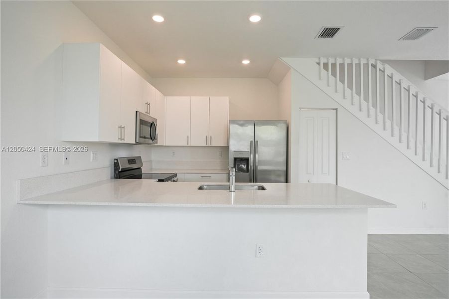 Furnished interior view inside a new home in , Homestead (Image 9). Furnished interior view inside a new home in , Homestead (Image 9).