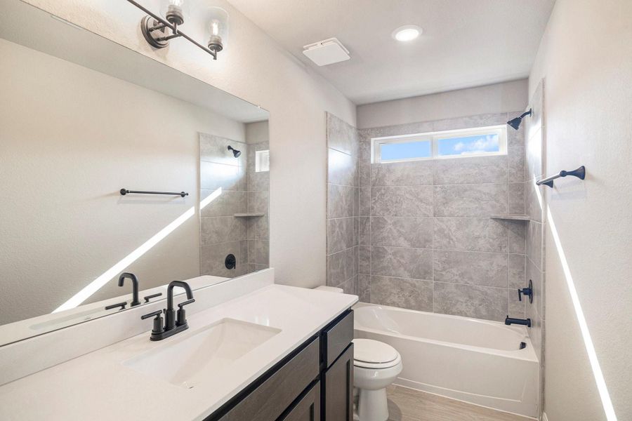 Furnished interior view inside a new home in Deer Pines, Conroe (Image 8).